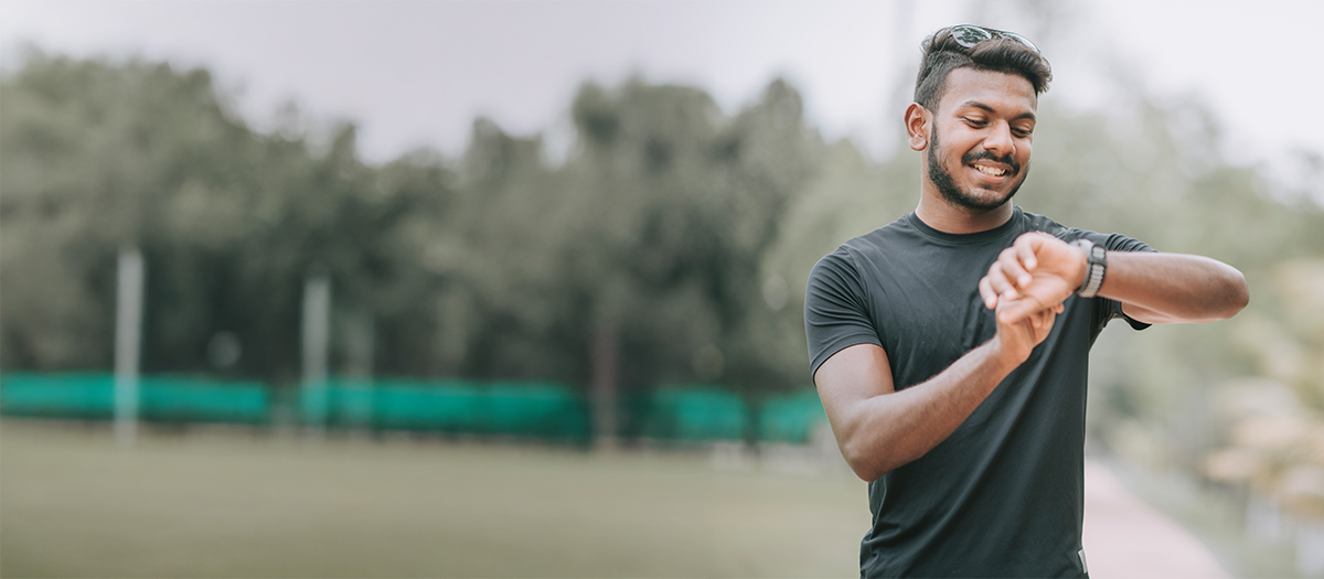 man using fitness watch